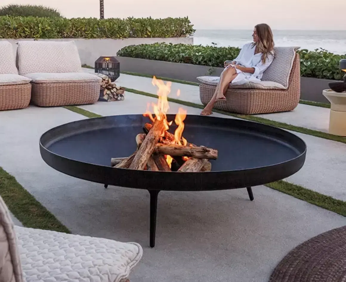 ADD WARMTH & AMBIANCE WITH FIRE PITS & FIRE TABLES